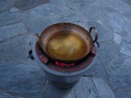 brass wok on tao burner