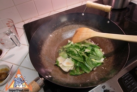 Simple Stir-Fried Bok Choy with Oyster Sauce - Next add oyster sauce and leaves