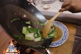 Simple Stir-Fried Bok Choy with Oyster Sauce - Pour it onto a plate