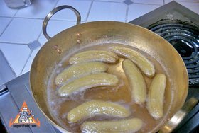 Thai Candied Bananas, 'Kluay Cheuam' - Boiling in brass wok