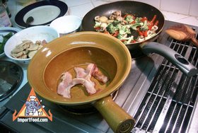 Thai-Style Noodles Baked in Clay Pot, 'Bamee Gai Op Mor Din' - Bacon on the bottom layer