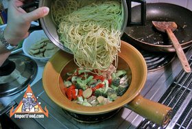 Thai-Style Noodles Baked in Clay Pot, 'Bamee Gai Op Mor Din' - Add cooked noodles