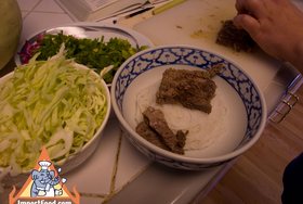 Vietnamese-Style Beef Noodle Soup - Set beef on top of cooked vermicelli