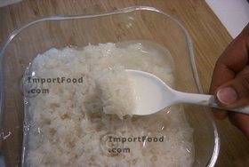 Thai Street Vendor for Thai Fermented Sweet Rice Dessert, 'Khao Mahk' - Final outcome after we made it at home. Note the liquid in the bowl. This is perfect Khao Mahk.