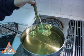 Golden Thai Pastry Cups, 'Kratong Tong' - Preheating the mold in oil
