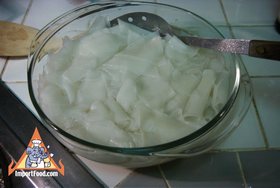 Thai Five-Spice Soup with Rice Chips, 'Kua Chap' - Cooked rice flake