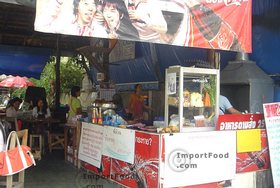 Thai Street Vendor for Thai-Style Wide Noodles In Thick Sauce, 'Kuaytiao Lad Na'