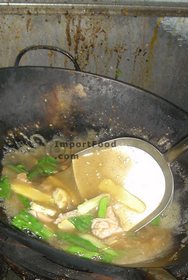 Thai Street Vendor for Thai-Style Wide Noodles In Thick Sauce, 'Kuaytiao Lad Na'