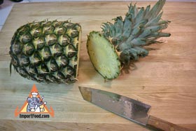 Peel and Slice Fresh Pineapple - Cut the top off