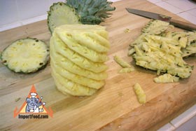 Peel and Slice Fresh Pineapple - Rinse with cool water