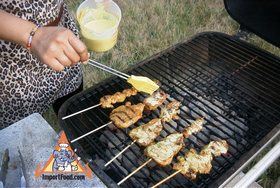 Thai Pork Satay, 'Moo Satay' - Baste the marinated skewers of pork
