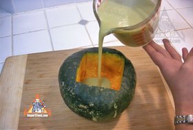 Thai Pumpkin Custard, 'Sankaya Phak Tong' - Pour custard into pumpkin, then steam