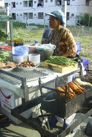 Thai Street Vendor for Thai Barbeque Chicken, 'Gai Yang'