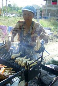Thai Street Vendor for Thai Barbeque Chicken, 'Gai Yang'