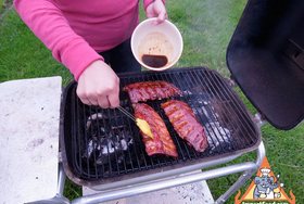 Sweet Chili and Root Beer Baby Back Ribs - Spread the delicious sauce