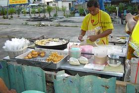 Thai Street Vendor for Thai Donuts, 'Pa Thong Ko'