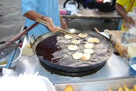 Thai Street Vendor for Thai Donuts, 'Pa Thong Ko'