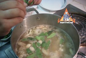 Tom Kha Salmon, Prepared by the Prime Minister of Thailand - Adding kaffir lime leaves