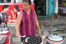 Cooking over a tao charcoal burner, the same type sold by ImportFood.com