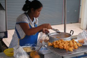 Street vendor in Thailand selling pa thong ko