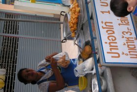 Street vendor in Thailand selling pa thong ko
