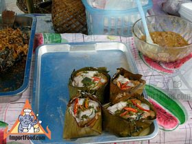 Thai Street Vendor Offers Haw Mukh from a Push Cart