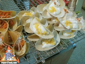 Thai Street Vendor Prepares Thai-Style Pancakes, 'Khanom Buang'
