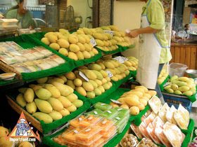 Bangkok Sidewalk Vendor Mae Varee Offers Sweets, Fresh Fruit and Sticky Rice - Mango and Fruit at Mae Varee