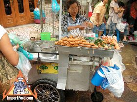 Thai Street Vendor Prepares Fried Pork Toast, 'Khanom Paung Na Moo'