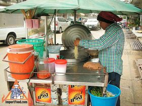 Thai Street Vendor Prepares Egg Noodle and Wonton Soup