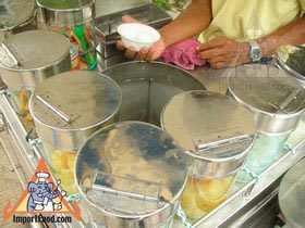 Thai Street Vendor Offers Candied Ice Cream from a Bicycle Cart