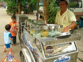 Thai Street Vendor Offers Candied Ice Cream from a Bicycle Cart