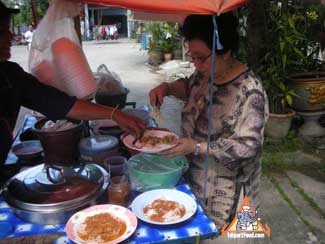 thai street vendor charcoal burner