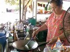 Street Vendor Prepares Two Variations of Pad Thai