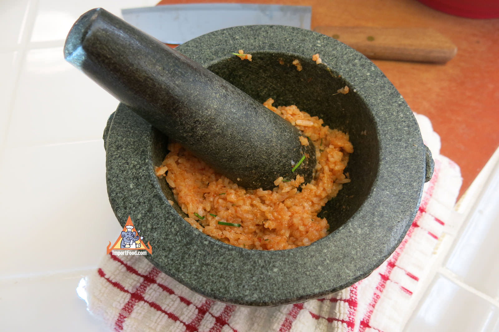 Pound in a mortar and pestle