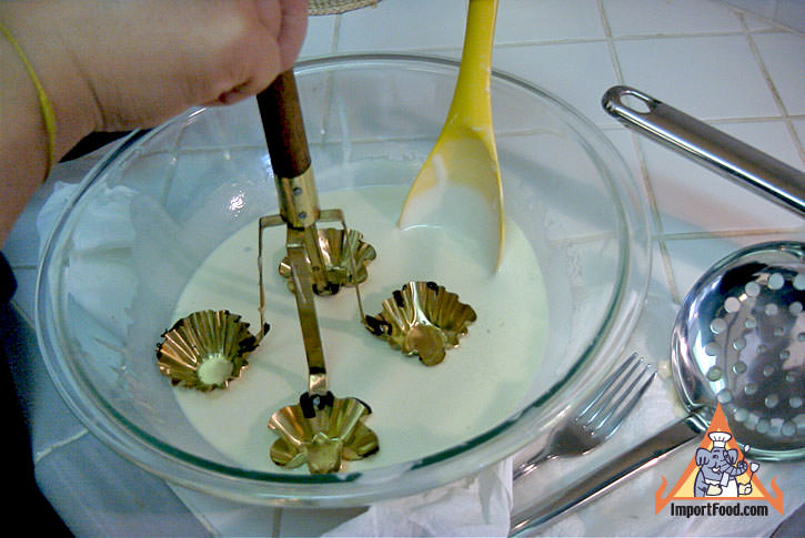 Dipping hot mold into batter