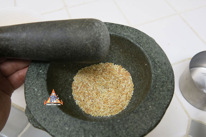 Roll Pestle Over Rice