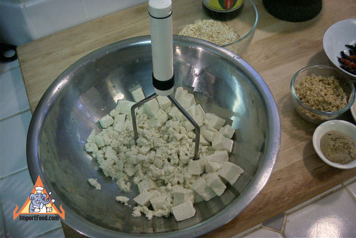 Mash boiled tofu