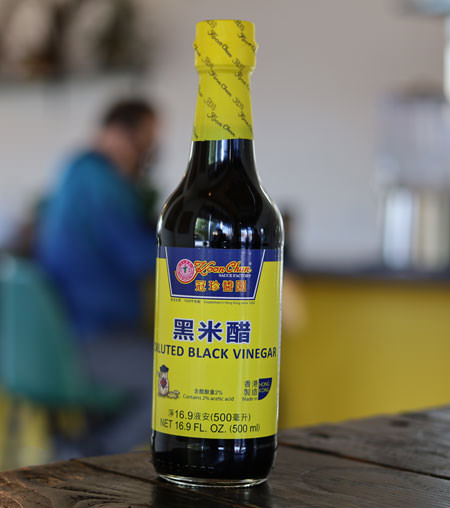 Black rice vinegar, Koon Chun brand, 16.9 oz bottle