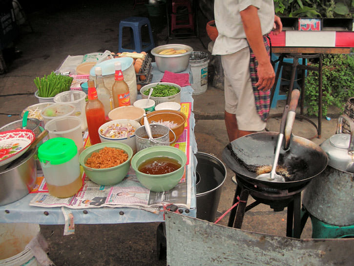 Thai Street Vendor Prepares Thai-Style Stir-Fried Noodles, 'Pad Thai'