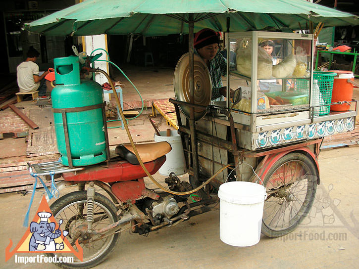 Thai Street Vendor Prepares Egg Noodle and Wonton Soup