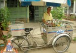 Thai Street Vendor Offers Candied Ice Cream from a Bicycle Cart